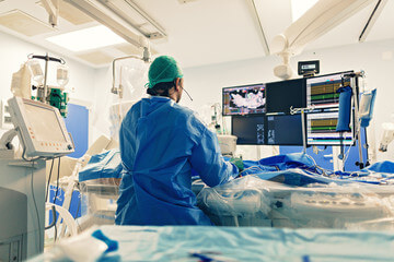 Doctors performing Balloon Angioplasty in operation theater